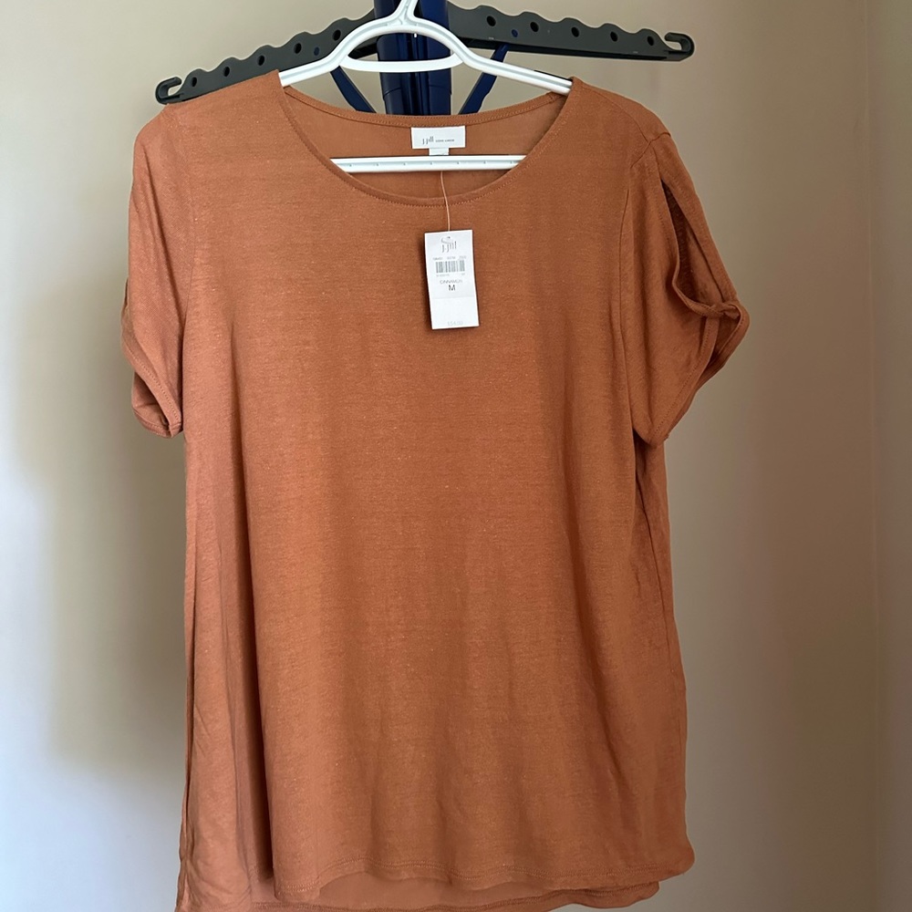 Brown blouse with open cap sleeve detail. NWT